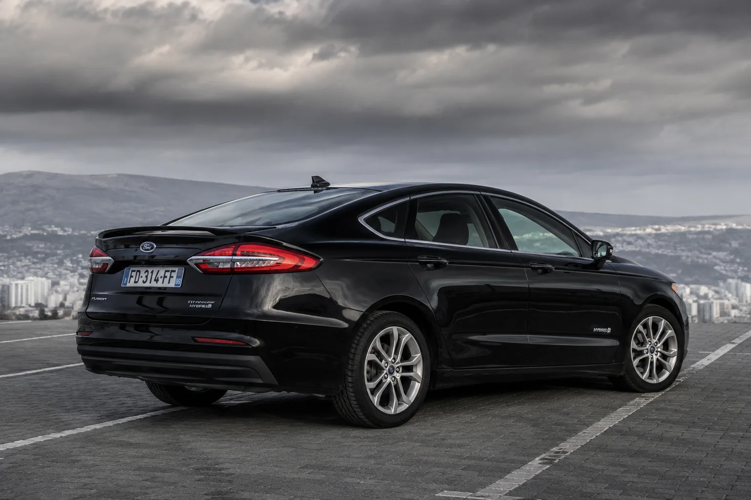 Ford Fusion Titanium Hybrid 2019 - rear view - RentGeo Cars